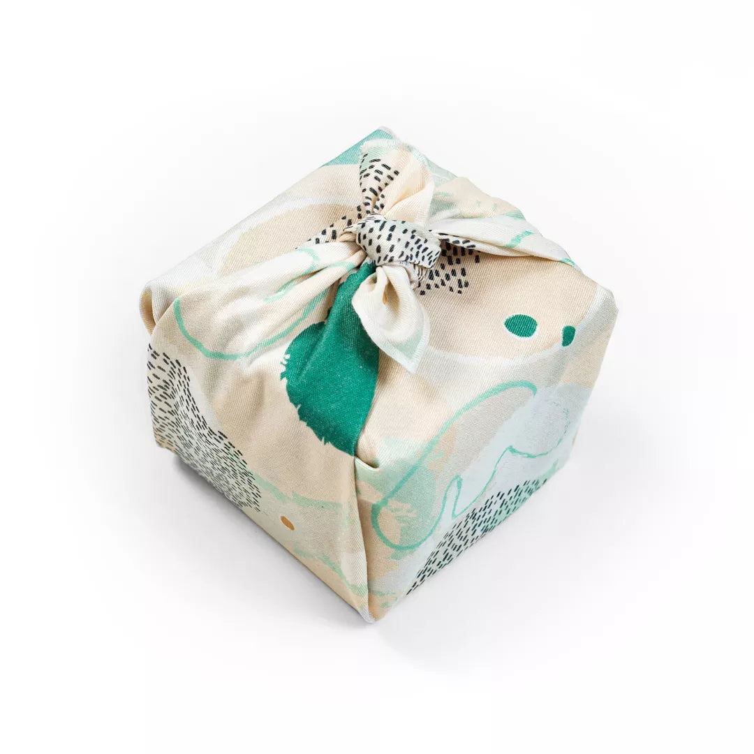 Furoshiki Hygge, die wiederverwendbare Geschenkverpackung aus Stoff – Paké